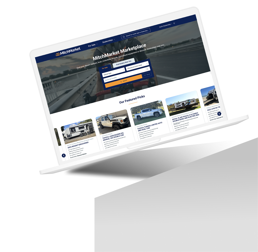 Laptop with MitchMarket website screenshot-1